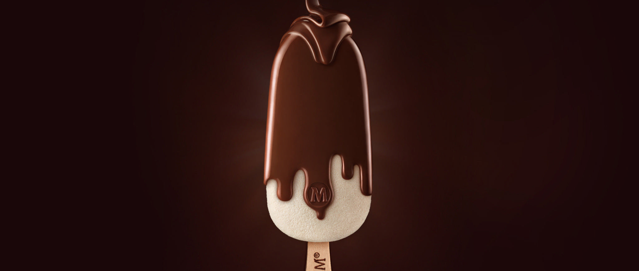 Magnum Classic Ice Cream Bar - Dripping Chocolate Onto Vanilla Ice Cream
